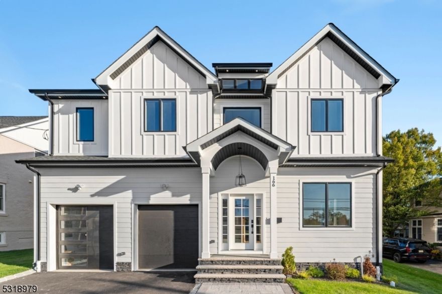 Welcome to this brand new, custom colonial home, surrounded by luxurious residences and situated on a sprawling 15,000 sq. ft. lot, offering endless possibilities to create your dream outdoor oasis. With a 10 Year Builder's Warranty, this masterpiece spans approximately 5,000 sq. ft. across three meticulously designed level. Boasting 6 bedrooms and 5.1 bathrooms, the home greets you with a grand 2 story foyer and 10 foot ceilings throughout, leading to sophisticated living and dining rooms adorned with intricate millwork and rich hardwood floors. Chef's kitchen, featuring high end appliances, a large center island with quartz countertops, custom cabinetry, a wet bar, and a walk in pantry. A gas fireplace with stone surround while sliding doors open to a deck overlooking the oversized. The first floor offers an en suite bedroom. Upstairs, you'll find four additional bedrooms, including the luxurious master suite, complete with a tray ceiling, an oversized walk in closet, and a spa inspired bath featuring a soaking tub, stall shower, and double vanity. The finished basement with 9 foot ceilings offers even more versatile living space, including a bedroom, full bathroom, and a large recreation room with a wet bar. Located in one of Livingston's most coveted neighborhoods. Don't miss the opportunity to make it your own!