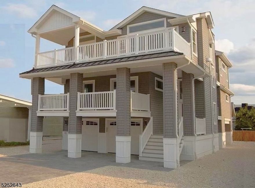 Reverse Living New Construction Features 5 bedrooms with 1 Master and 2 Junior suites, 4   Baths, Den with Wet Bar, Large Formal Living Room & Dining Room, Kitchen With Professional Grade Appliances, Multi Zone Heating & Air Conditioning, Anderson Doors & Windows, Fireplace, Elevator, And More!