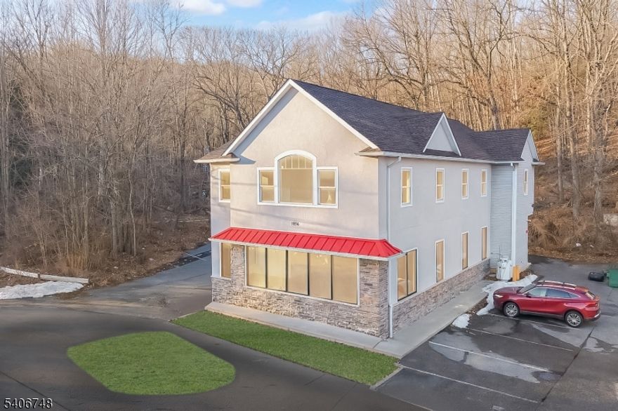 Prominent 3,750 square foot commercial building constructed in 2019, positioned directly on Route 23 within the Highway Commercial Zone. The property offers strong highway visibility, generous on site parking, and a flexible open interior suitable for retail, showroom, gallery, medical, or professional office use. The modern interior features high ceilings, recessed lighting, large display windows, and a clean open layout that can accommodate single occupant use or segmented professional suites. The building presents well for owner occupants seeking strong brand exposure or investors targeting quality commercial tenancy. Located on the northbound side of Route 23, the site benefits from steady daily traffic counts and regional accessibility.