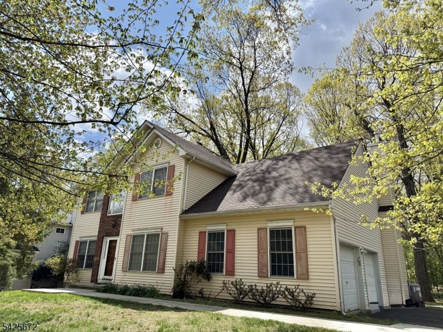 Spacious Colonial situated on a private half-acre cul-de-sac lot, featuring hardwood floors and generously sized rooms throughout. The convenient eat-in kitchen offers a center island and sliders leading to a deck overlooking a serene wooded backyard perfect for relaxing or entertaining. A formal dining room provides an ideal space for gatherings, while the vaulted family room with fireplace adds warmth and charm. The first floor includes a bedroom with a full bath, as well as a laundry room equipped with front-loading appliances for added convenience. Upstairs, the primary suite features a walk-in closet, double sinks, and a luxurious jacuzzi tub. Additional highlights include a full basement, 2-car garage, and major updates roof, furnace, and water heater all just 3 years old. The home also comes mostly furnished, including a piano and ping pong table. Conveniently located just minutes from the library and local amenities.