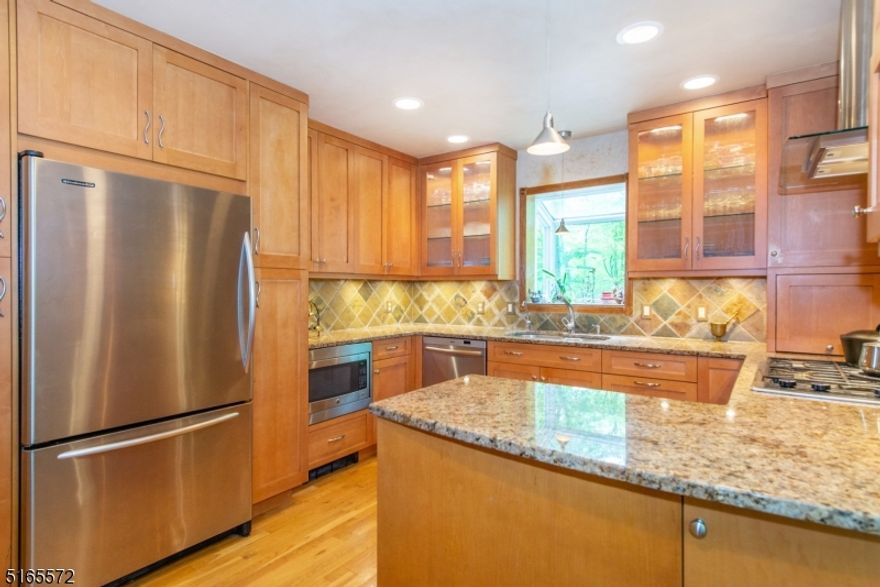 Not an ordinary colonial, this beautiful updated home has character and special touches! Private lot on cul de sac street with winter views, perennials and herb gardens, shade in summer, the setting is peaceful and tranquil! FRESHLY PAINTED INTERIOR! Oak flooring upstairs and down, oak interior doors, special moldings, Marvin wood windows, newer water heater, well pump and central air, many updates, there's nothing to be done but move in and enjoy! Kitchen features granite countertops and slate backsplash, Bosch dishwasher and range with hood vent, recessed and under counter lighting, greenhouse window and spacious breakfast area. Entertainment sized dining room will accommodate the largest of tables, huge living room and expanded family room with skylights, wood burning fireplace, walls of windows and views of nature. Four spacious bedrooms, including primary suite with large tumbled marble bath and oversized stall shower, dual vanities create the perfect getaway! Finished basement with cedar closet, 2 car garage and newly sealed driveway leave nothing to be done, just enjoy! East side of Chester, minutes to Mendham.  Chester schools and top rated West Morris Mendham High School. HWA home warranty included, for peace of mind.