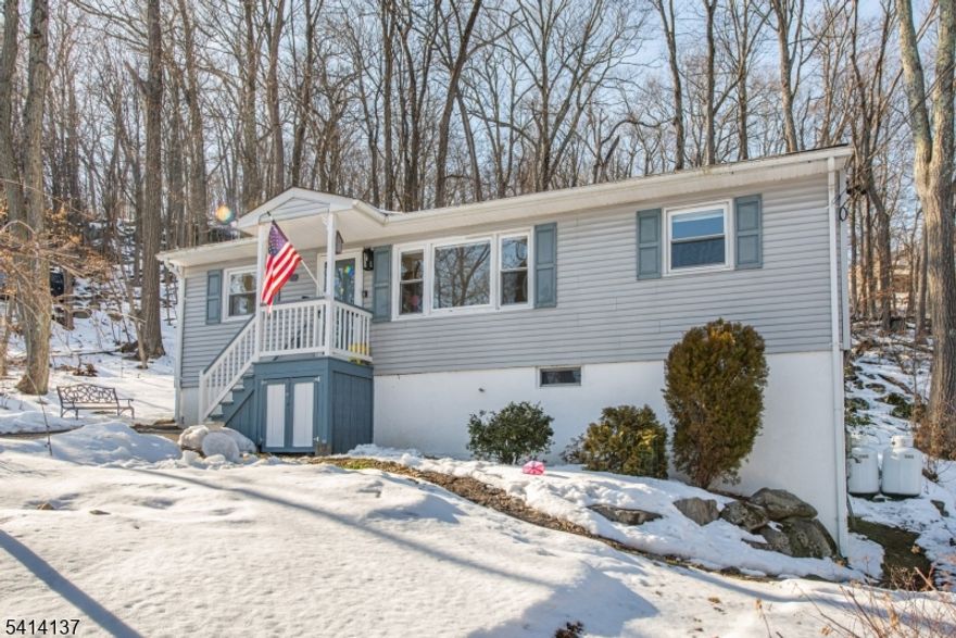 Welcome to 17 Valley View Road, a delightful 800 sq. ft. 2 bedroom, 1 bathroom residence that perfectly blends simplicity with the natural beauty of Sussex County. Built in 1961, this home sits on a generous 7,405 sq. ft. lot, providing ample outdoor space for walks, entertaining, or simply enjoying the peaceful neighborhood atmosphere. This property is ideal for those seeking a starter home, a manageable downsizer, or an investment opportunity in Vernon. Its efficient footprint is complemented by a tranquil location that offers the lake life while remaining close to the region's top outdoor recreation.