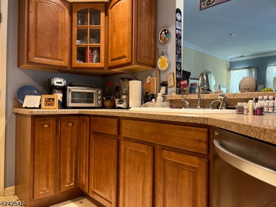 First Floor Corner Frazier unit with 2 bedroom - 2 full bath with Fireplace and patio area!  Enjoy 'The Glens' with community pool, tennis courts, and easy access to town lake, golf course, library, schools, and major highways. Decompress after work with easy-living at The Glens! Unit is being sold as-is where is - ideal for investor or someone who is interested in doing a little sweat equity. Unit has an updated kitchen but needs a little love. Awesome location! Principals only for showings.