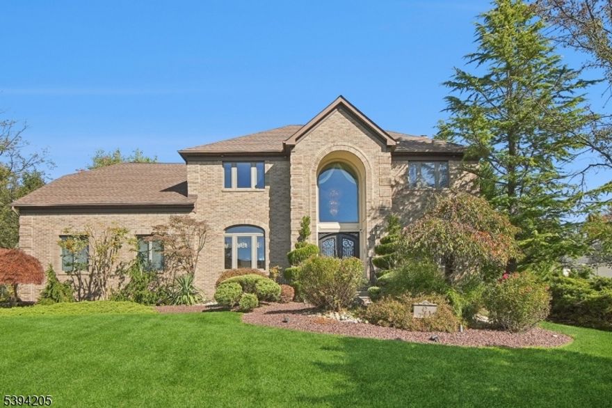 Nestled on a highly sought after cul-de-sac, this CUSTOM colonial is loaded w/designer features and QUALITY craftsmanship throughout.As you step inside, you are greeted by a grand two-story foyer featuring elegant crown molding and iron balusters flanked by a bright DR that perfectly flows into the CHEF'S eat-in kitchen equipped w/all the bells & whistles. Straight ahead, the warm family room featuring a wood-burning FP was designed for relaxation while the formal living room w/ beautiful french doors offers additional space for hosting. Completing the main level is a first-floor bedroom w/ full bath, an updated 2023 laundry room, and direct entry to the attached two-car garage. Upstairs, the impressive primary suite is a true retreat, w/ an EXPANSIVE sitting area & 2 large walk-in closets.The SPA-LIKE bath includes a dual shower, soaking tub, full vanity, & skylight, creating a bright, luxurious feel. Three additional well-sized bedrooms and a double-vanity hall bath complete the second floor. A full-size climate-controlled attic adds valuable year-round storage. The basement is an ENTERTAINER'S DREAM! A Rec room, media room, bar, kitchenette, bath, & play room provide the ultimate playground for all ages. Outside, the backyard OASIS on .58 acres of professionally landscaped grounds offers total privacy & features both a fenced in-ground pool w/ a new liner & a huge deck with a retractable awning perfect for outdoor gatherings. This is a place you'll be so proud to call home