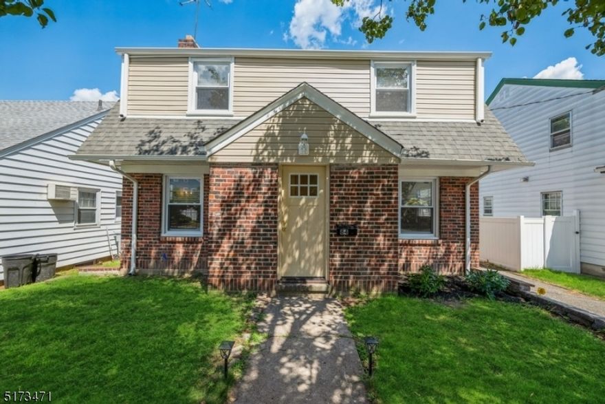 This beautifully remolded 2-story colonial home borders the Borough of Totowa, is walkable to the Westside Park, & feels open & airy, with plenty of windows & natural light. Almost everything is BRAND-NEW in this home, including windows & cordless blinds, roof & siding on home and 2-car garage, external doors, baseboard heat, gas furnace, hot water heater & a fantastic kitchen that opens up to the dining room and comes complete W/stainless steel appliances & garnet counter tops. This home has stunning refinished hardwood floors on both 1st and 2nd floors & has an attractive staircase leading to the 2nd floor. Enjoy cozy winter nights in front of the wood-burning fireplace in the living room & warm summer days in the sunroom looking over a decent-sized backyard - Do I hear Pool potential? The basement is partially finished, with washer/dryer hookups, slop sink, and utilities, & it can be fully finished. 3 bedrooms and a full main bath are located on the 2nd floor with plenty of windows letting in the sunshine. This home is move-in ready, conveniently located, has great off-street parking, & is waiting to be enjoyed!