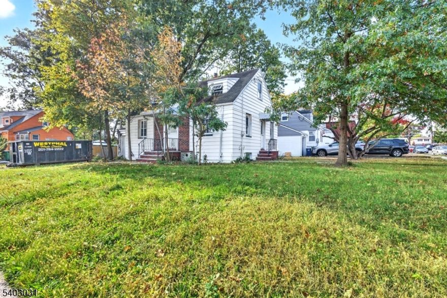 Unlock the potential of this corner-lot home in a sought-after location just moments from schools and shopping. This 2-bedroom, 1-bath fixer-upper offers endless possibilities renovate, expand, or create a second-floor primary suite to suit your needs. The sun-filled living room, kitchen, two bedrooms, full bath, and high-ceiling basement provide a solid starting point for customization. Perfect for builders, investors, or buyers eager to design their dream home in a fantastic neighborhood. Property sold AS-IS. Some photos are virtually staged.