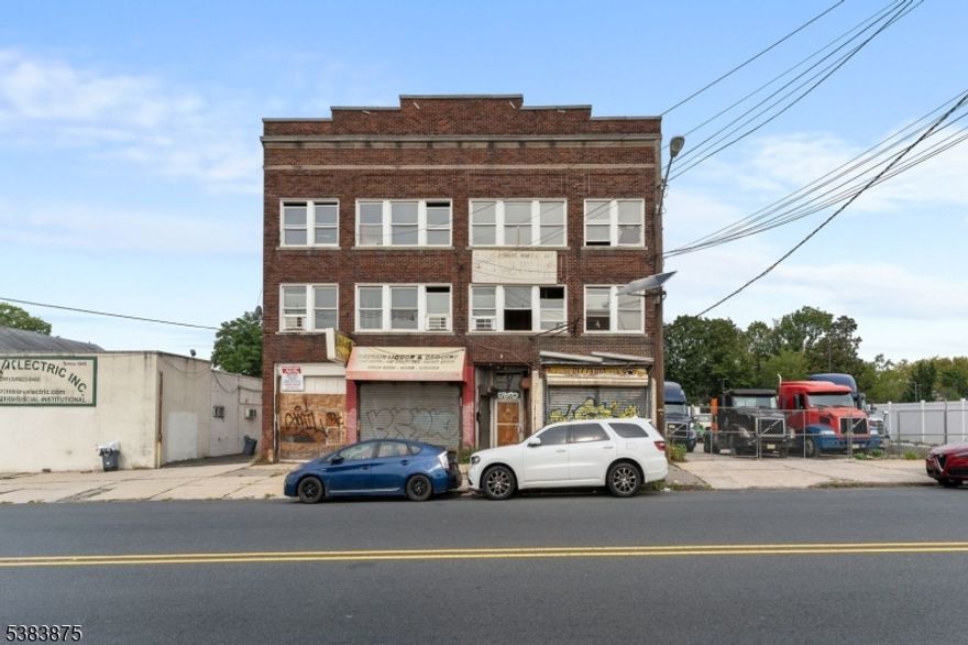 Exceptional investment opportunity in Hillside! This mixed-use property offers two commercial spaces on the first floor and upper levels with excellent potential for apartments or condominiums. Zoned OC (Office Commercial), the property allows for a wide variety of uses including offices and professional buildings, retail stores and personal services, townhouses and condominiums, plus accessory uses such as parking and loading. The sale also includes the adjacent vacant lot at 1448 N Broad St (approx. 8,814 sq ft), providing added space for expansion or new development.With outstanding visibility, strong foot traffic, and a prime location just minutes from Newark, Jersey City, and New York City, this is a rare chance to bring your vision to life in a high-demand area.