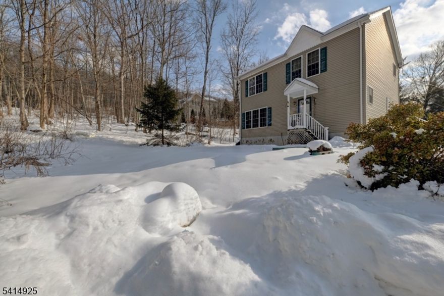 Wonderful 3 bedroom, 2.5 bath Colonial in the Cozy Lake section of Oak Ridge in Jefferson Township. Nice and private. This house is situated at the end of a dead end street surrounded by a wooded area. This modular home was built in 2007 and features a nice size kitchen and separate breakfast nook. Plenty of cabinets and counterspace and stainless steel appliances. Sliders from kitchen lead to a wood deck. There is also a large living room and a large formal dining room. A half bath completes the first floor. Upstairs has 3 nice size bedrooms and 2 full baths. Attic with pull down stairs. Great location. Close to major highways, transportation, and shopping. Don't miss this one!. You won't be disappointed.