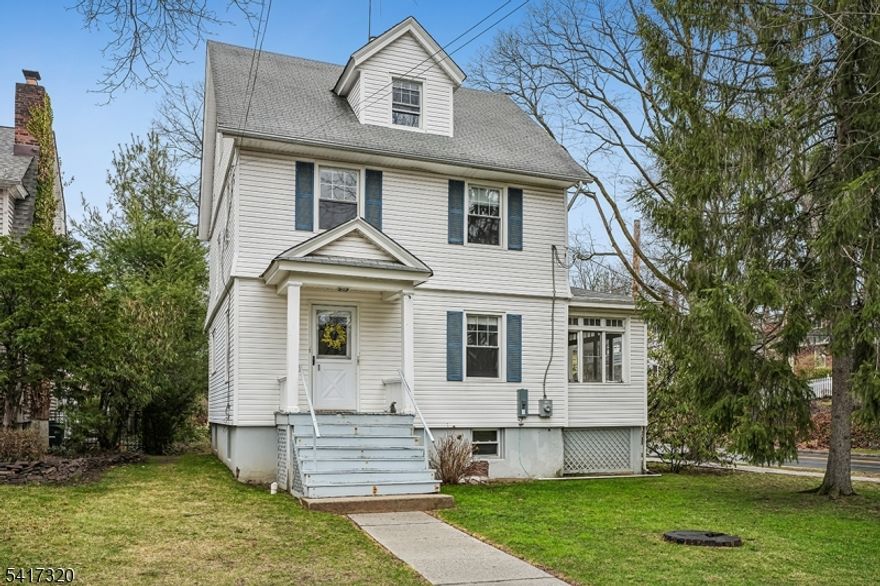 Opportunity knocks in this 3 BR/ 1 BA Colonial (built in 1918) that features excellent structural "bones" and architectural elements from its by-gone era that include oversized windows, vintage chestnut trims and five-panel doors, high ceilings, hardwood floors and more.  Located in a great neighborhood within blocks of Jefferson Elementary School and Summit Family Aquatic Center. Wide entries off the Entry Foyer introduce the bright Living Room and Formal Dining Room, each with large windows on two sides, while an enclosed Sun Room has wood floors, windows on three sides & bench seat. The spacious Kitchen features a walk-in Pantry closet as well as a back entry vestibule that leads from the driveway. 2nd Floor has 3 bedrooms, each with windows on two sides, along with a full hall bath with tub shower and built-in hall linen closet. The expansive third floor and unfinished lower level offer excellent expansion possibilities, if desired.  Level backyard w/ room for entertaining. Recent updates incl: new gas boiler (Dec 2025), new chimney liner (Dec 2025), copper pipes installed in basement (2023), updated electrical panel (2023), newer hot water heater (2025), newer asphalt driveway (2024), newer back steps and railing (Sept 2024). Bring your creative vision and make this home your own! House being sold strictly in "AS IS" condition and the Buyer is responsible for obtaining the Certificate of Occupancy from the City of Summit and any lender required repairs/permits.