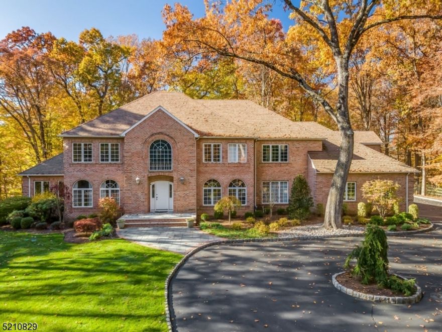 Stunning updated spacious four-sided brick colonial is located at the end of a quiet cul de sac. The recently renovated kitchen has top-of-the-line appliances including Bosch DW, a Sub Zero fridge, & Dacor double wall oven. The sundrenched great room is the perfect place for a large gathering with a wet bar, a wine fridge & gas fireplace. The sunroom could be your favorite room to relax in! This home is complete with a 1st floor en-suite with a full bathroom. The primary suite is a true getaway! The remodeled bath has a steam shower & heated flooring. You won't want to leave the oversized dressing room with two counters & four large closets. At the end of the day, you'll want to reenergize in the basement with your sauna, gym, entertainment bar & game room. Minutes from Route 78 and 287. This home is truly a level above the rest! (Buyer responsible to confirm elementary school).