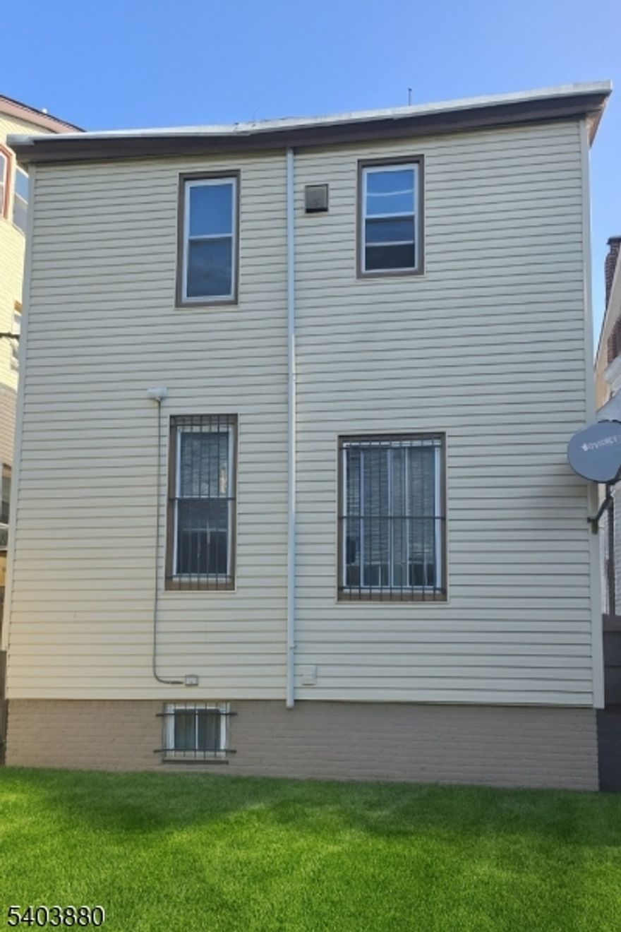 Spacious 2- unit home with great potential, located in the historic weequachic section of Newark. First Floor: Bright and airy with beautiful hardwood floors, large living/dining area, 2 bedrooms, 1 bath. Second Floor: 4 bedrooms, 1 bath.Basement: Full, unfinished, with ample storage or customization potential. This home just minutes from Newark Penn Station, schools, places of worship, highways, and shops.Ideal for homeowners or investors. A must-see!