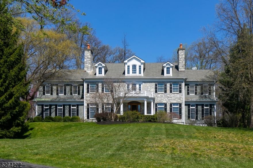This exquisite colonial exudes sophistication & tranquility.Nestled on a sprawling 2+ acre lot in one of Basking Ridge's most elegant neighborhoods, this property offers breathtaking views & a level backyard adorned with a paver patio and resort-style pool. Meticulous attention to detail becomes evident, earning the prestigious "Best Custom Home of The Year" accolade from the NJ Builders Assoc. The custom kitchen is a culinary haven, featuring a generous island, marble countertops, dual sinks, top-of-the-line appliances, & eating area w/ view of the secluded backyard. 2 butler pantries seamlessly connect to the formal dining room, allowing for effortless entertaining. Custom office w/French doors provides a refined workspace. The home's luxurious ambiance is accentuated by 10-foot ceilings, 3 fireplaces, and hardwood floors throughout. The first-floor bedr with en-suite bath adds a delightful touch. The second floor has an additional 5 bdrs, incl. a primary suite w/sitting room, spa-like bathroom, & stunning boutique style walk-in closet. The finished basement, adorned with daylight windows, offers an additional full bathroom, home theater & abundant recreational space.RECENT ENHANCEMENTS, REPLACED SEPTIC (2023), new driveway lined w/ Belgian Blocks (2023), 2 HVAC units(2023), UPDATED BATHROOMS (2023),Home Theater (2023) & so much more.Conveniently located near shopping, commuter rails, & highways, this home is part of the award-winning Basking Ridge School District.