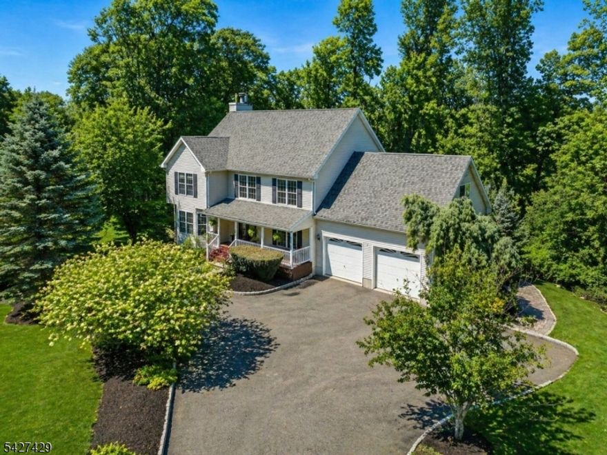 Just renovated & perfectly positioned on a quiet, upscale cul-de-sac, this classic Center Hall Colonial delivers the rare combination of privacy, space, & turnkey living on 1.44 acres moments from the energy of Lake Hopatcong. A welcoming covered front porch off a circular driveway sets the tone. Inside, a soaring two-story foyer opens to approx. 2,843 sq ft of renovated, move-in-ready  living. The heart of the home is the eat-in kitchen flowing seamlessly into a sunlit family room w/ a brick surround wood-burning fireplace made for everyday living & effortless entertaining. Upstairs, you'll find 4 spacious bedrooms plus a versatile bonus room perfect as a playroom, office, or media space. The fully finished walkout lower level w/ full bath expands your lifestyle even further guest suite, gym, rec room your choice. Step outside & it gets even better: a screened-in porch w/ a stone floor creates a true indoor-outdoor experience for summer nights & fall mornings. A 2-car garage w/ built-in storage, & direct access to a peaceful walking trail at the end of the cul-de-sac complete the setting. And when you're ready for lake life? You're just 4 minutes from boating, dining, entertainment & sunsets at The Windlass Restaurant & beautiful Lake Hopatcong. Prime location, quiet cul-de-sac street with easy access to all major roads, schools, shopping, lake activities, lakeside dining and an easy NYC commute by car or train. Fireplace, Chimneys and Flues convey as is- no known issues.