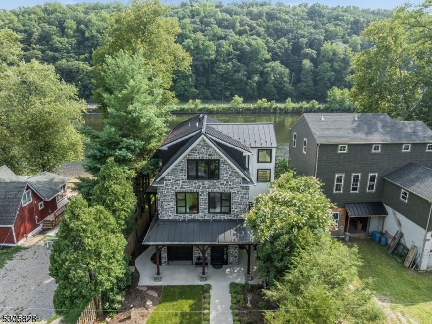 Renovated From Foundation Up With All New Systems and High Grade Finishes No Expense Spared On This Riverfront Home. This 3 Bedroom Luxury Modern Sanctuary Is Perched Alongside The Delaware With 3 Levels Of Living Space and Equipped With A Personal Use Elevator That Opens Up To Modern Spaces and Designs With Incredible Views. The Second Level You Will Find The Professional -Grade Kitchen With Center Island, 6 Burner Wolf Stove, Sub Zero Refrigerator & Pantry. A Screened Balcony, Dining Area and Living Room With Fireplace, 2 Nicely Appointed Bedrooms With A Full Bath. The Third Level Boasts The Master Bedroom With A Full Bath, Walk-In Closet, Office and Laundry Room. The Ground Level Is Waterproofed With Pvc Trim & Rain Screen, fiberglass under IPE Brazilian  hardwood, , Custom Railings, Engineered Lumber Throughout, 2 Zone Heat & Air, 20Kw Whole House Generator, Engineered Lumber Throughout, Custom Stone Home With Stone From Rolling Rock Quarry, Top Of The Line Systems Including Alarm With Elaborate Cameras, Whole House Stereo System Throughout. All Systems Can Be Run Remotely. You Will Appreciate Every Outstanding Detail and Forethought in Every Aspect Of This Spectacular Home From The Location, Panoramic View and The Elevation. Enjoy & Experience The Dining and Culture Of The Rivertown's, Just Minutes Away To Stockton-Lambertville and New Hope. Easy Access To Nyc, Philadelphia, & Princeton  fiberglass under IPE Brazilian  hardwood,