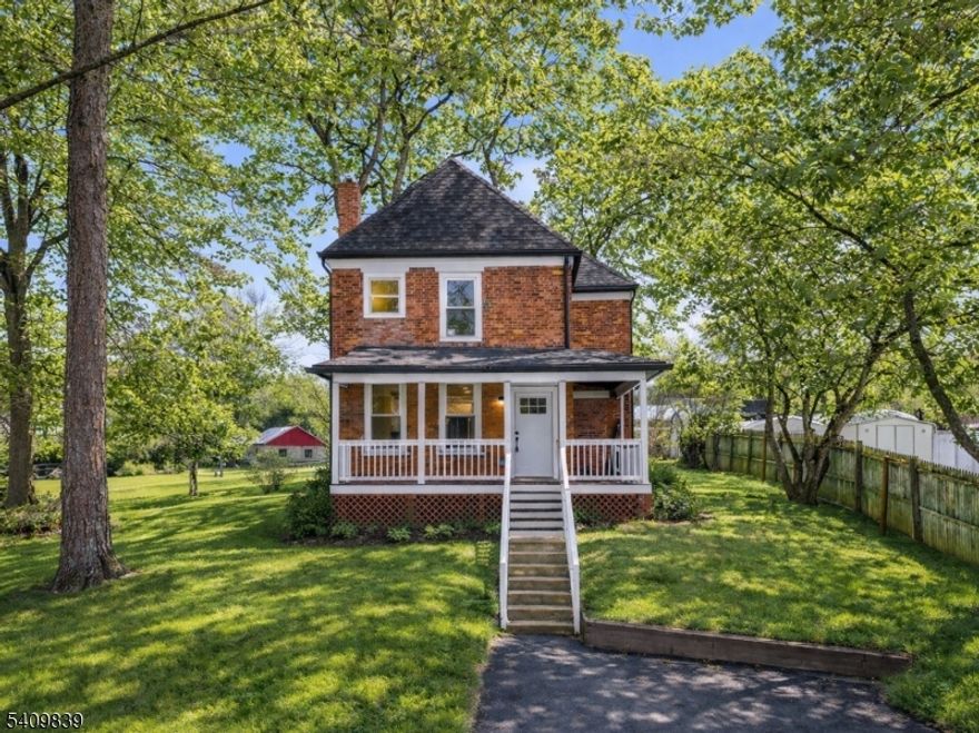 Welcome to 71 Wishing Well Road, where historic brick architecture meets thoughtful modern renovation. This move-in ready home offers a seamless blend of character, comfort, and everyday functionality. The main level features an inviting living room, a beautifully updated kitchen with stainless steel appliances and dining area, a full bath, convenient laundry, and a flexible bonus room ideal for a home office, den, or playroom. Upstairs, three light-filled bedrooms create a peaceful retreat, complemented by a stylishly renovated bathroom. Sliding glass doors open to a spacious rear patio designed for entertaining, outdoor dining, or quiet mornings, while the front and back lawn areas provide room to relax, garden, or play. Tucked along a quiet street with just a few neighboring homes, the setting offers a sense of privacy while remaining close to local conveniences. Additional highlights include central air, oil heat, a detached garage, and ample parking. Ideally located in Hamburg, known for its scenic beauty and year-round recreation, residents enjoy easy access to hiking, biking, fishing, golf, skiing, and nearby mountain views. Combining timeless appeal with modern updates, 71 Wishing Well Road presents a rare opportunity to own a fully renovated home in a tranquil setting without sacrificing accessibility.