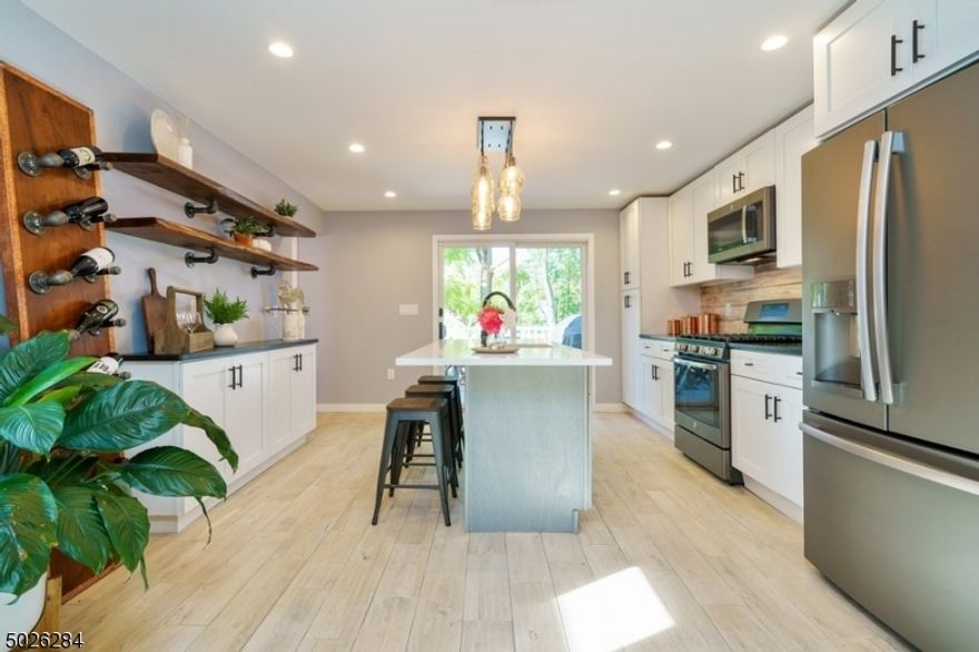 BEAUTIFUL, BRIGHT, LIGHT, AND LOVED HOME is waiting for you!!  First floor features open layout concept, living/ dining room, absolutely amazing chef kitchen with an island and stainless steel appliances opening to the spacious deck, which is  overlooking fenced in yard, powder room. Second floor offers: primary bedroom w/ full bath w/ oversized shower, walk-in closet; as well as second bedroom & main bath. Third floor office helps you work from home, or provides additional entertainment space. Full walk-out basement w/ laundry room and utility room, lots of storage space. Level yard backing to park provides harmony or can be used for entertainment-choice is yours! No pets, very good credit is a must, NTN required from all adults. Tenants responsible for all utilities, lawn maintenance, and snow removal. Pictures are from old listing. Come and fall in love with your new home!!!