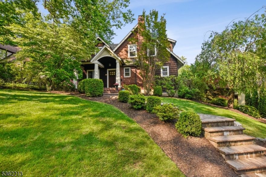 This spacious, move-in ready 5 bed 3.1 bath expanded Colonial located just steps from South Mountain Reservation in Millburn's tree-lined Wyoming neighborhood is the one you've been waiting for! The exterior is loaded with curb appeal, featuring high-end landscaping, paver pathways, and welcoming front porch. Inside you will find room to spare. The first floor features a large living room with wood burning fireplace, beautiful formal dining room, flexible office/sitting room, family room with fireplace, powder room, and an expansive updated kitchen with stainless steel appliances including built-in wine fridge. Plus a butler's pantry and a separate breakfast area. From the family room or breakfast area, step out to the backyard to relax or entertain guests. Upstairs, the huge primary suite is your own private retreat, with lots of natural light, two walk-in closets, a private balcony, and updated en suite with soaking tub. There are three three other large bedrooms, an updated full hall bath, and a large laundry room. The lower level provides additional room with a rec room, bedroom/office, exercise room, full bath, as well as additional storage space and access to the attached 2-car garage. Additional features include 2-zone central air/heat, whole home generator, in-ground irrigation system, French drains, and first floor speakers. Don't let this one pass you by!