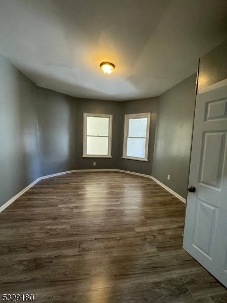 Beautiful renovated apartment. 3 bedrooms, one bathrooms, living room, large kitchen,  washer and dryer in the unit, Central AC,Use of back yard backyard.