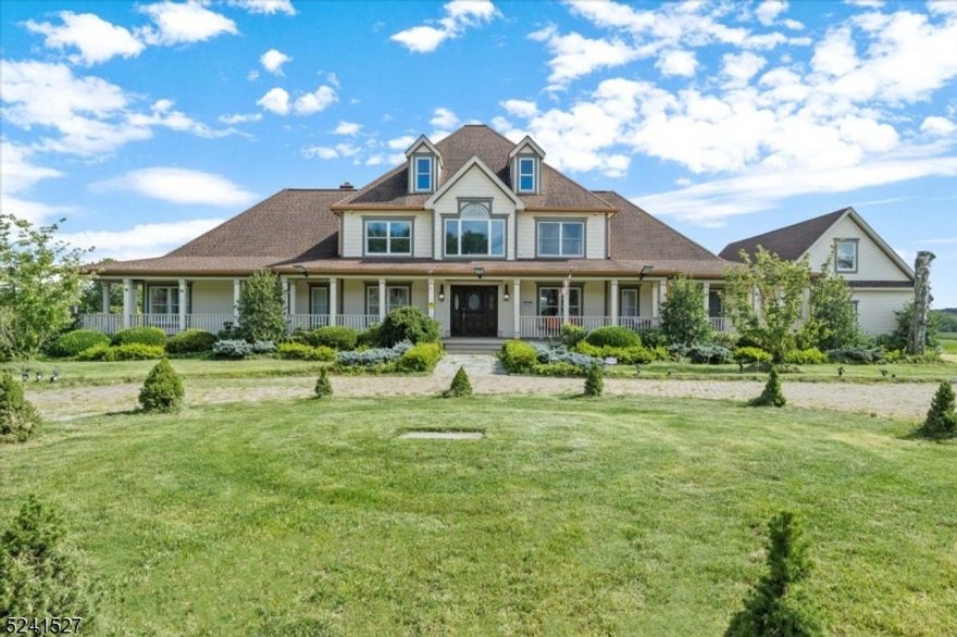 Nestled on over approx. 76 acres this exceptional and updated 7-bedroom, 6-bathroom estate embodies the essence of sophisticated country living. Revel in the breathtaking pastoral vistas, encompassing a pool, tennis court, pond, gardens, and lush landscapes, all visible from this stunning home. As you approach along the tree-lined circular drive, you'll appreciate the connection between the residence and an 8-stall barn, run-in sheds, and fenced pastures with a riding ring. Step inside to discover an expansive chef's kitchen and breakfast room, complete with custom cabinetry, HGH END appliances, leading to a sunlit family room and adorned with custom moldings.  The spacious first-floor master suite, freshly painted and updated, boasts a master bath, along with a walk-in closet. The private master sitting room offers a serene space to gaze out over the farm. A generously sized recessed glass-enclosed gym adjoins the sitting room. This level also features an office, an au pair suite, and a generously sized mudroom, all freshly painted and updated. There is second office is situated above the three-car garage with an incredible view of the property. The finished walk-out lower level, has a wood-burning fireplace a full updated kitchen, making it a perfect place for entertaining. This lower level also accommodates a full guest apartment with a separate entrance for added privacy. Enjoy jaw-dropping views in this one of a kind property!