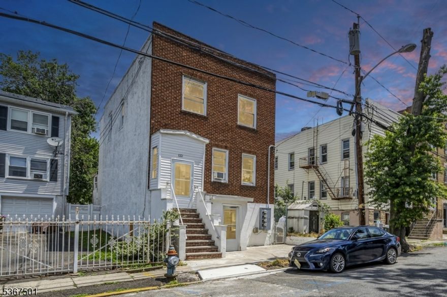 Welcome to this well-maintained and income-producing three-family home located on a quiet, residential street in Irvington. Each of the three units offers two spacious bedrooms and one full bathroom, with separate utilities a perfect setup for investors or owner-occupants looking to offset their mortgage with rental income.The backyard is generously sized, ideal for relaxing or entertaining.Whether you're an investor expanding your portfolio or a homeowner seeking a multi-family property with steady rental income, this property checks all the boxes. Located in a peaceful neighborhood, yet close to major transportation, shopping, and schools.Don't miss this turnkey opportunity fully rented and ready to generate income from day one!