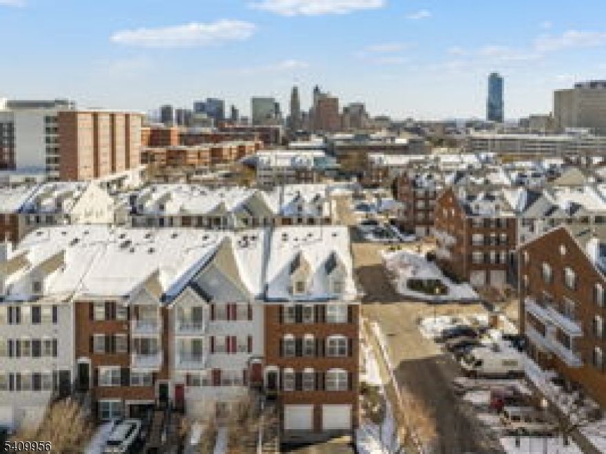 Welcome to 226 Matthews Dr, a beautiful townhouse in the Society Hill section of Newark NJ, just minutes away from Rutgers University. This home offers 3 spacious bedrooms and 2.5 bathrooms, features a sun-filled living room, a generous dinette, and a modern kitchen with stainless steel appliances, granite countertops and a huge pantry. A private balcony is located just off of the kitchen. Hardwood floors run throughout, and the primary bedroom includes an en-suite bathroom.  Additional highlights include in-unit laundry, a two car tandem garage, and community amenities such as a pool and tennis courts. Conveniently located near to NYC transportation, major highways, whole foods, parks and much more.