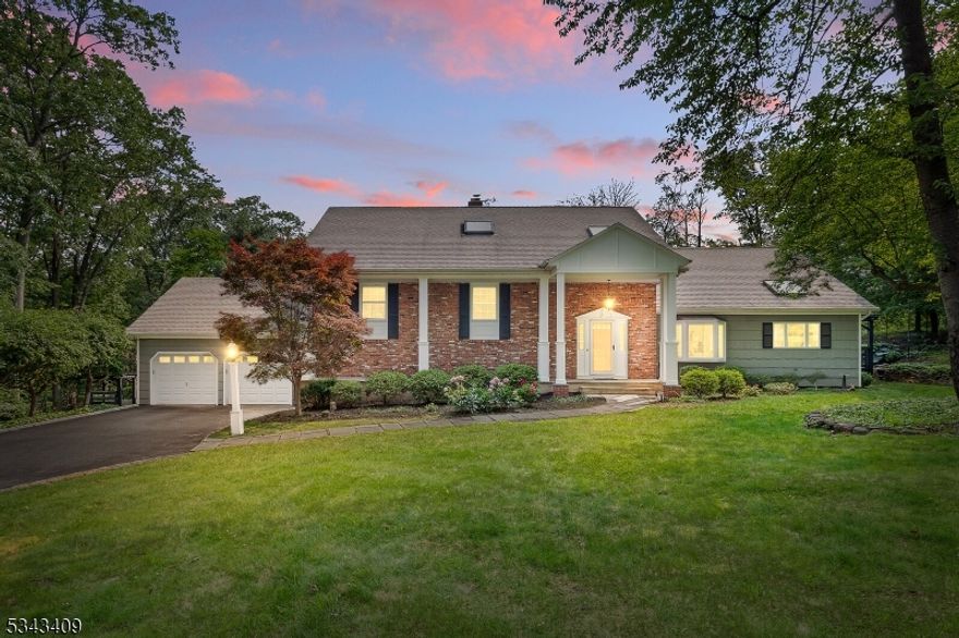 Bathed in sunlight and set in a premier tranquil location, this spectacularly updated home is a true showpiece of pride, elegance and inspiring living. Step into the welcoming two0story foyer, you are greeted with inviting warmth of a home that has been meticulously loved, beautifully maintained, thoughtfully enhanced at every turn. The centrally positioned floorplan offers refined, yet comfortable spaces designed for intimate moments and unforgettable gatherings. Featuring 5 generously sized bedrooms & 3.5 baths, this home includes a stunning renovated primary en-suite sanctuary highlighted by a cathedral ceiling bathroom. The top floor loft offers countless possibilities " whether as a family room, game room, office, or creative haven. The finished ground level, complete with a fireplace and indoor barbeque, unveils a spacious great room/media lounge ideal for cinematic evenings or relaxed everyday enjoyment. Step outside and prepare to be captivated. Backyard unfolds into a breathtaking resort-caliber oasis centered around a dazzling heated in-ground pool, sun-shelf and spa with cascading waterfalls that shimmer in the sunlight. Surrounded by exquisite landscaping, artfully placed natural boulders, lush greenery and blooming flowers, the outdoor setting feels both dramatic and tranquil. This private paradise is designed for luxury living and endless entertaining. This is a home to experience " a radiant sanctuary where elegance, comfort and resort-style beauty converge.