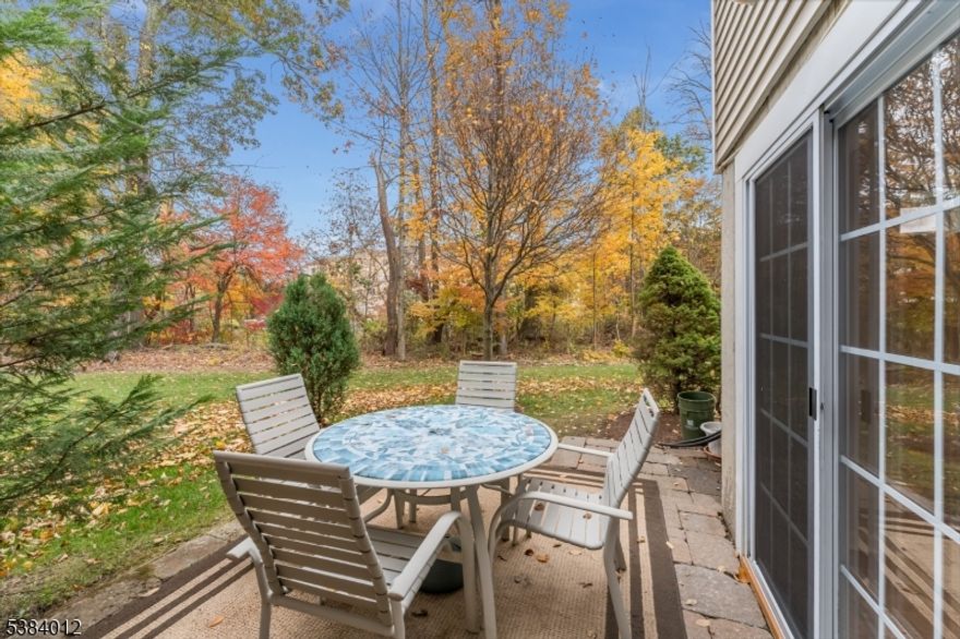 Just Like a Private Home End Unit Asbury Model is Beautiful, Spacious, Updated, Bright, Sunny & Freshly Painted. Offers 2 story foyer, 3 Bedrooms, 3.5 Baths. Living Room, Dining Room, Eat in Kitchens. WALK OUT FINISHED BASEMENT WITH A GUEST SUITE COMPLETE WITH A STUDIO /BEDROOM OR OFFICE, KITCHEN, DINING AREA, FULL BATH (WALK IN SHOWER), Storage and Utility Room. Enter the Foyer has garage access and Powder Room. Formal Dining Rm has Hardwood Floors. Eat in Gourmet Kitchen, 42" Cabinets, gas stove, granite countertops, tile floor. Living Rm with Gas Fireplace (as is - no knows issues), Sliders onto Deck overlooking the Wooded Landscape. Bedroom 3 (Mid level), The 2nd Level has the Primary Suite w/ensuite Bath & Stall Shower and 2 walk/in closets, Bedroom 2 and a Full Bath. Walk Out Finished Basement sliders onto Paver Patio with Privacy and Views of the Lush Landscape. AMMENITIES : Pool. Tennis, Basketball & Playground. MOUNT OLIVE SCHOOL DISTRICT. Like a Private Home With Serene Setting in desirable Woodfield Estate.