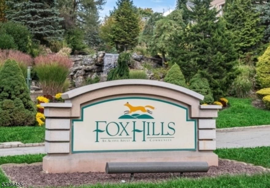Fox Hills, a gated active 55+ community in Rockaway Township. This well-maintained Buckingham model on the first floor offers convenient one-level living with 2 bedrooms and 2 full bathrooms. The layout includes a kitchen with a breakfast bar, an open living/dining area, and a screened-in patio. Brand new flooring is being installed in the dining/living room and bedrooms. Additional features include an in-unit full-size washer/dryer, a primary suite with two oversized closets, a soaking tub, a separate walk-in shower, and a double-sink vanity. The second bedroom also has an oversized closet and its own full bathroom with a tub/shower combo. 1 assigned garage space + private storage area in the basement are included, along with additional outdoor parking. Community amenities include indoor & outdoor pools, fitness rooms, a clubhouse, activity rooms, a library, tennis courts, and a ballroom. Complementary shuttle service provides access to nearby shopping and other local destinations. Rent includes use of community amenities.