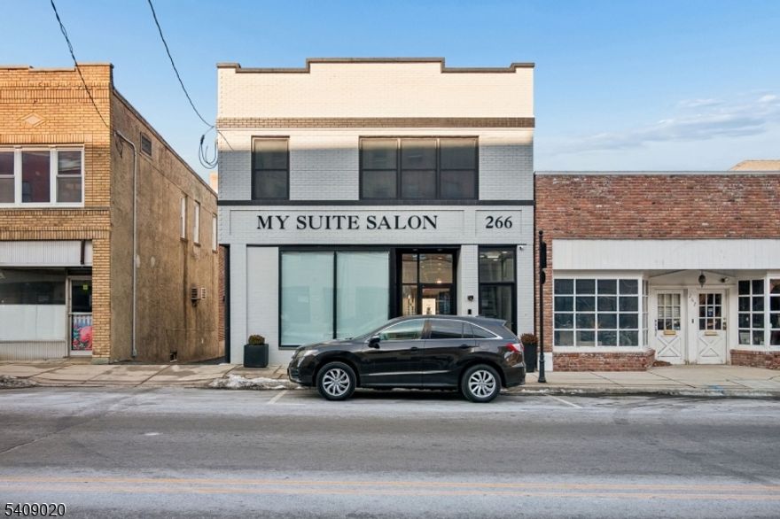 LIVE IN DOWNTOWN SPRINGFIELD! TWO ASSIGNED OFF-STREET PARKING SPOTS are available behind the building! Elegantly updated, 2 bedrooms, 1 bath apartment in the heart of town. You will be the first to live in this unit. Brand new stainless steel appliances with microwave and dishwasher (including in unit washer/dryer), large bathroom, and lots of light. This unit has a security system ring doorbell. Close to bus to NYC, restaurants and stores. Additional parking is also available per request for an additional fee.