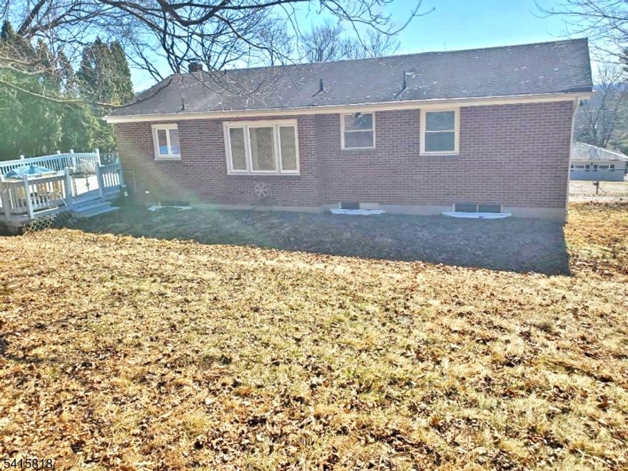 THIS RANCH BOASTS AN OPEN FLOOR PLAN WITH THE FORMAL LIVING ROOM, FORMAL DINING ROOM, & KITCHEN ALL FLOWING SEAMLESSLY INTO ONE ANOTHER, CATERING TO BOTH LARGE AND SMALL GATHERINGS, MAKING IT IDEAL FOR ENTERTAINING. ACCESS TO LARGE OVERSIZED DECK OFF KITCHEN EXPANDING SEASONAL LIVING SPACE. LARGE BEDROOMS WITH AMPLE CLOSET SPACE. BASEMENT LEVEL LAUNDRY, STORAGE, & GARAGE ACCESS- THIS IS IDEAL FOR ADDITIONAL FINISHED LIVING SPACE; BRING YOUR IMAGINATION! A SPACIOUS DECK OVERLOOKING LEVEL OPEN, FENCED IN YARD. WITH PERSONALIZED TOUCHES, THIS PROPERTY CAN EASILY BECOME YOUR LONG-TERM HOME. CONVENIENTLY LOCATED CLOSE TO TOWN SCHOOLS, VARIOUS RESTAURANTS, SHOPPING OPTIONS, NUMEROUS PARKS, GOLF COURSES & RECREATIONAL FACILITIES, NYC BUS & TRAIN, & MAJOR HIGHWAYS- 78 & 31. THIS HOME OFFERS YOU THE OPPORTUNITY TO PUT YOUR PERSONAL TOUCHES ON THIS DIAMOND IN THE ROUGH AND CREATE YOUR FOREVER DREAM HOME! BUYER RESPONSIBLE FOR ALL INSPECTIONS, TOWN CO/CERTS. BUYER SHOULD CONDUCT OWN DUE DILIGENCE AND CONFIRM ALL HOME DETAILS WITH TOWN. VA DOES NOT PAY CUSTOMARY CLOSING COSTS, INCL TITLE, ESCROW FEES, SURVEY. IF PROPERTY WAS BUILT PRIOR TO 1978, LEAD BASED PAINT POTENTIALLY EXISTS. THIS PROPERTY MAY QUALIFY FOR SELLER FINANCING (VENDEE).