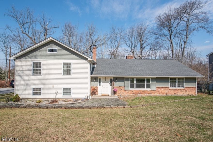 OPPORTUNITY KNOCKS!! 4 bed, 2.1 bath custom split located in the highly desirable Alpine section of Lake Mohawk.Featuring crown moulding, new flooring, large bedrooms, an oversized 2 car garage & driveway for extended parking, & multi-zone central air and heating. Nat Gas available in the street. Double sided fireplace provides warmth & ambiance to multiple rooms.Sliders lead to large deck overlooking the flat yard.Updated kitchen equipped with newer SS appliances, recessed lighting, attached dining area, along with an additional open dining/family room space.2 attic spaces for great storage options.Year round access to Lake Mohawk and all of the amenities, as well as exclusive access to Alpine Pool (beach) for an additional fee where you can swim, relax on the beach, fish, BBQ, and attend their community events! Don't miss out on this amazing opportunity to live on one of the most desired streets in Lake Mohawk!