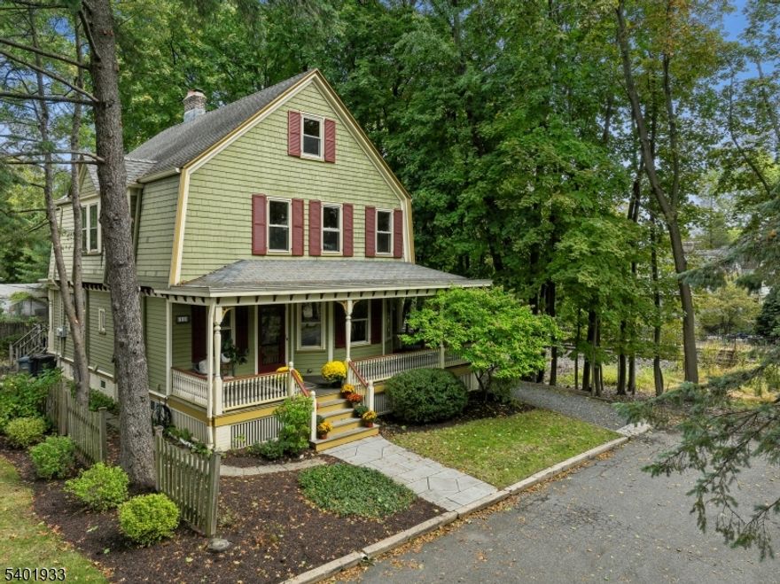 Experience Modern Heritage at its finest in this stunning 1909 Colonial, perfectly positioned in the heart of Montclair's coveted Upper Mountain/Bradford area, steps to Mountain Station. From the moment you arrive, the gorgeous Ipe wood wrap-around porch sets a high bar for curb appeal and relaxation the ultimate sanctuary for morning coffee or evening cocktails. Inside, the home is meticulously refreshed for 2026 buyers. A brand-new, sophisticated palette paired with curated designer light fixtures blends historic soul and contemporary elegance. The layout embraces a Zoned Open Plan, offering airy, light-filled rooms with 9ft+ ceilings that flow seamlessly while maintaining the distinct "Quiet Luxury" of defined living spaces. With 5 generous bedrooms, plus a versatile Flex-Room ideal for a high-end hybrid office/wellness sanctuary, the 2,250+ sq. ft. is as functional as it is beautiful. This move-in-ready gem features an updated and timeless Eat-in Kitchen with wood cabinetry, green marble countertops, and stainless steel appliances, and two updated baths. Artisanal Details, harmonizing early 20th-century craftsmanship with the modern updates of Central Air, 200 amp elec, and newer Kitchen/Baths will impress Buyers. Located steps from top-rated schools, train station and Iris Gardens, 11 Valley Pl offers a Hyper-Local lifestyle. Whether hosting on the expansive Ipe porch or enjoying the serene, freshly updated interiors, this property is a masterclass in Curated Living.
