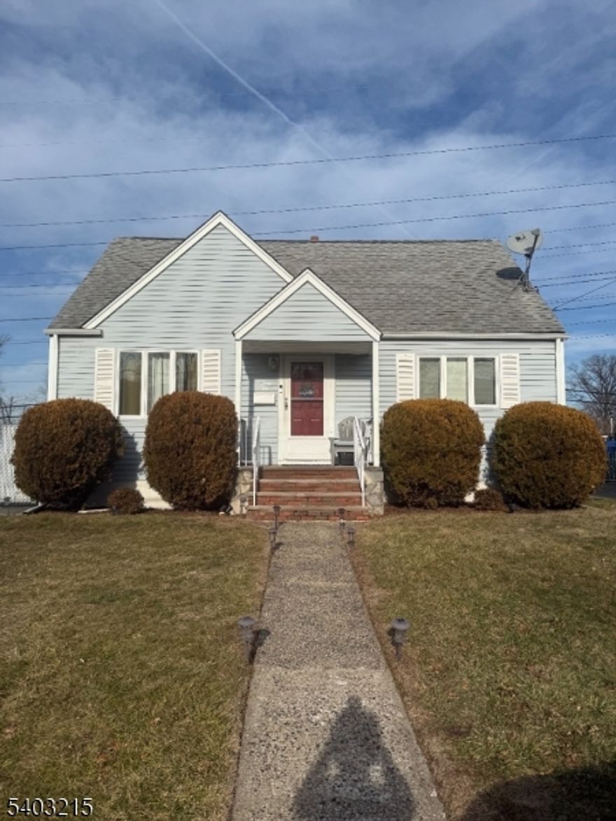 Feel the warmth and comfort to this home as you enter.  Hardwood floors throughout first floor.  Bright living room on first floor.  Eat in Kitchen with stainless steel appliances and plenty of cabinet space and storage.  Full primary bathroom with jetted tub, two full bedrooms and linen closet on first floor.  Spacious bedroom on 2nd floor with plenty of storage space.  Finished basement and full bathroom complete the home.  Fenced in yard, above ground pool.  2 car detached garage spacious enough for storage and parking, comes with garage automatic openers.  Central A/C, forced hot air.  Solar panel transferable. Close to parks, schools and NYC Transportation.