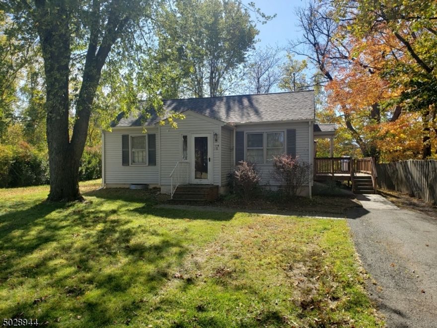 Charming one story home with nice size eat in Kitchen.  Living room with wood floors.  2 Bedrooms have carpet.  Updated bathroom.  Lanudry hook ups in basement accessed from out side.  Large Deck.