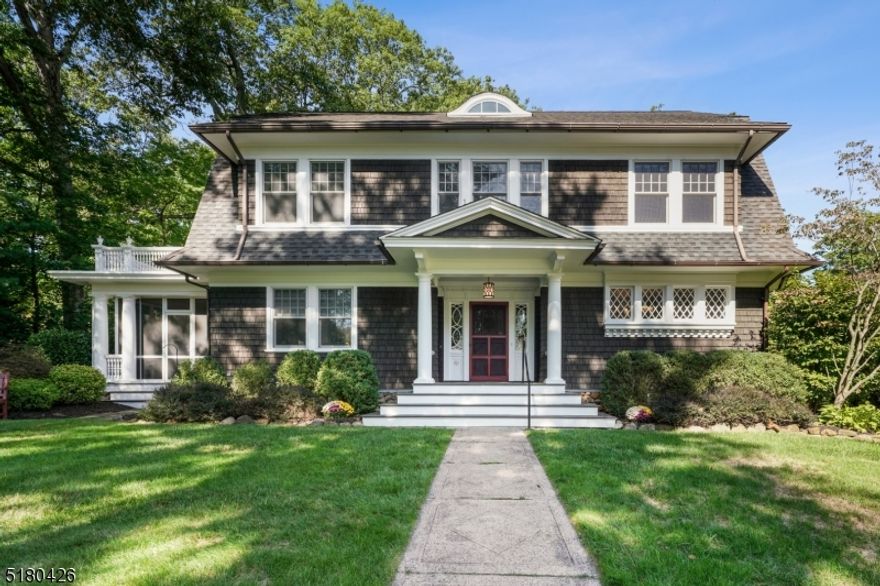 Vintage 1906 colonial in sought after Madison neighborhood. Home has had several renovations over the years, with many modern conveniences but still featuring much of its original charm.  Large gourmet eat-in kitchen with center island, professional grade appliances, separate eat-in area & butler's pantry.  An open floor plan with perfect flow for entertaining makes good use of space. High ceilings gives the illusion of modern construction. Period moldings, chair rails, wainscoting, built-ins & woodwork. Hardwood floor, much original to the house. Most recent improvements include new Hunter Douglas shades throughout; primary bedroom renovation with two rooms being combined into one, new wiring, lighting, windows, door to roof top deck, new walk-in closet, coffered ceiling; opened up service staircase into kitchen; new light fixtures; living room taken down to the studs, all new wiring, lighting, new fireplace surround & built-in cabinets, new windows (some original kept for decorative purposes),new French doors out to front to back screened in porch, decorative beams installed across ceiling; new high-end vinyl plank flooring in basement, new carpet on basement stairs, washer/dryer (2018); much of the interior/exterior has been meticulously prepped & painted.  Bathrooms renovated with classic touches in keeping with charm of house.  Private backyard with new privacy fence, professional landscaping and mature trees.  Location is .6 miles to NYC train & .9 to Downtown.