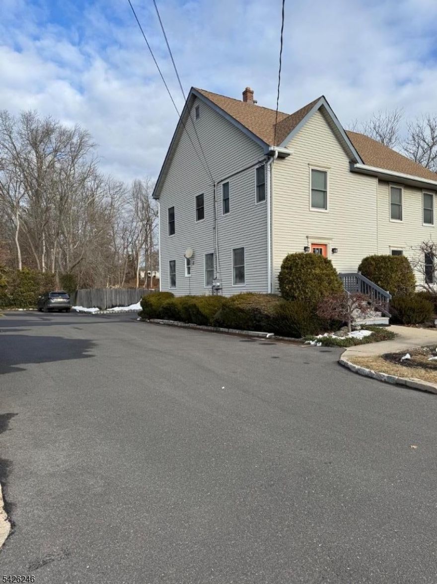 Welcome to this beautifully maintained mixed use property. Conveniently located near the Stirling Train station. First floor of building is being used as a karate studio with a large 25 x 29 open floor room, two separate waiting room, two private offices, finished basement, hard wood floors, powder room, front and back entrance.Entire second floor space is being used as residential, open floor plan with high ceiling, hard wood floors and full attic space. Kitchen with access to large balcony. Detached oversized  garage. Current tenant are willing to stay, current lease is month to month, long time tenancy. Great opportunity for investors or owner occupied with income producing first floor space. Separate utilities. Recently updates: parking black top, electrical box, second floor A/C and roof in 2005.