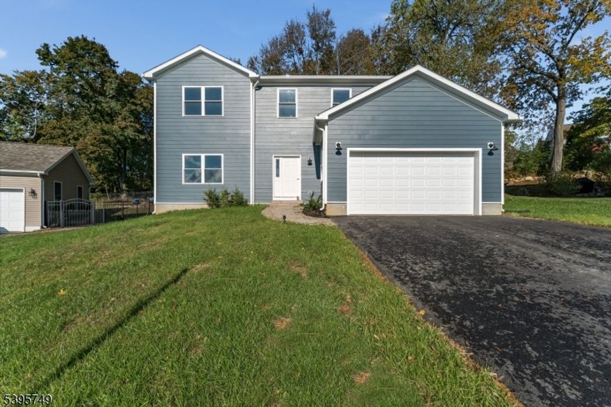 Welcome to your dream home! This beautifully designed 4-bedroom, 3-bath residence offers spacious living with thoughtful upgrades throughout. Step onto the front steps and view the home's exceptional curb appeal. Inside, you're greeted by a welcoming foyer that flows into a bright living room and kitchen, featuring gorgeous cabinetry, a center island, and plenty of storage ideal for entertaining and everyday living. The dining room is bathed in natural light, creating a warm and inviting atmosphere.Upstairs, you'll find three well-appointed bedrooms, includin a primary suite with sweeping views of Hunterdon County. The full basement is ready for your finishing touches whether you envision a home office, gym, or extra storage space, the possibilities are endless.Additional highlights include:200 Amp Electrical Service to support modern lifestylesTwo-Zone High-Efficiency Forced Hot Air & Central AC System50-Gallon Bradford White Gas Water HeaterInsulated Superior Foundation with 15-Year WarrantyUnderground Utilities for a clean, unobstructed landscapeNewly Graded Lawn with Premium Topsoil and Mature Rear Trees for privacy and shadeBuilt to Exceed Local Building Codes for peace of mindFinancing Options AvailableThis home combines quality construction with comfort and style in a serene setting. Don't miss your chance to own this exceptional property schedule your private showing today!