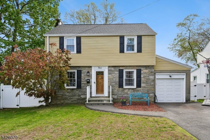 Welcome to this pristine 3-bedroom expanded Colonial located in a great sought after West Orange neighborhood!From the moment you arrive, you'll appreciate the meticulous curb appeal and beautifully maintained grounds. You'll immediately love the gorgeous hardwood floors and updated kitchen. The inviting living room with wood burning fireplace flows seamlessly into a fabulous rear family room, featuring a glass sliding door leading to the large deck, patio and expansive fenced yard. The updated kitchen opens to a large dining room creating the perfect layout for everyday living and entertaining. Upstairs, you'll find 3 generously sized bedrooms and a beautifully renovated full bath. The primary bedroom offers vaulted ceilings, a large walk-in closet and large windows with tons of sunlight. The finished basement provides excellent additional living space, complete with a recreation area, great storage/shelving, a laundry room, and full bath. The attached garage offers incredible flexibility ideal for storage, hobbies, or even a potential home gym. A large driveway, an EV charger, 2 sheds and custom blinds are some of the additional amenities that are included. All this is conveniently located near top-rated schools, shopping and Essex County Park. This home truly offers the best of community living.