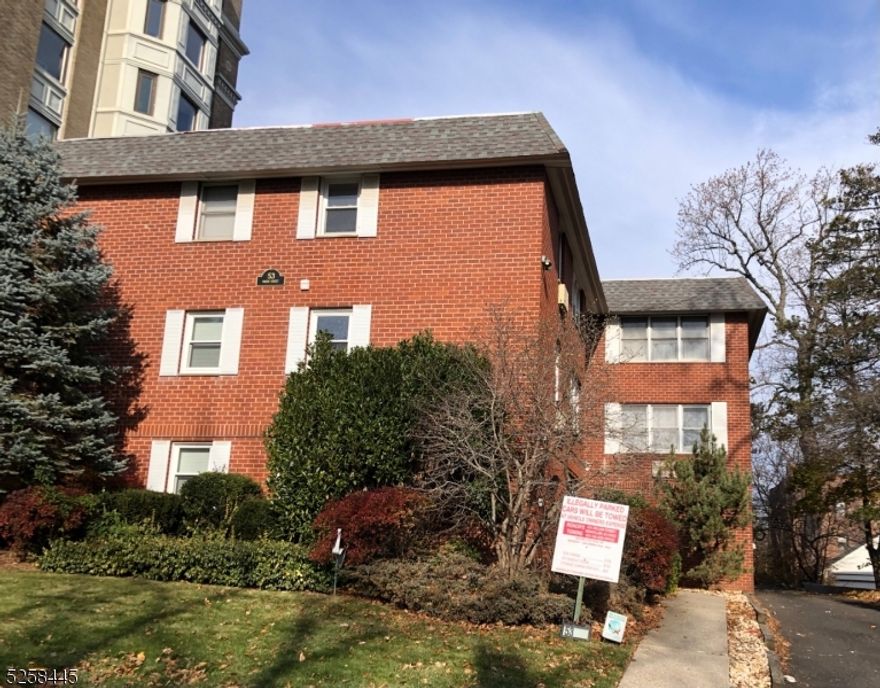 Sold with Concession.  Prime location on residential street.  ALL brick 3 story apartment building in the heart of beautiful and desirable Estate Section in Montclair.   SUNNY and SPACIOUS 7 Unit Apartment - (2) 2 Br Apts (One Renovated), (5) 1 Br Apts (Some renovated). Hardwood Floors in some units. 11 parking spaces, Indoor and outdoor parking. (4 Indoor garage- can be $350 per month and 6 Outdoor - can be $200 per month) Convenient to NYC trains and buses, shops, restaurants, parks, highways.  Coin Operated Washer and Dryer in Building on 1st Floor.  Rents are under market value.  Potential Gross Monthly Income: $16,600. Seller Financing NOT an OPTION. Cash preferred.