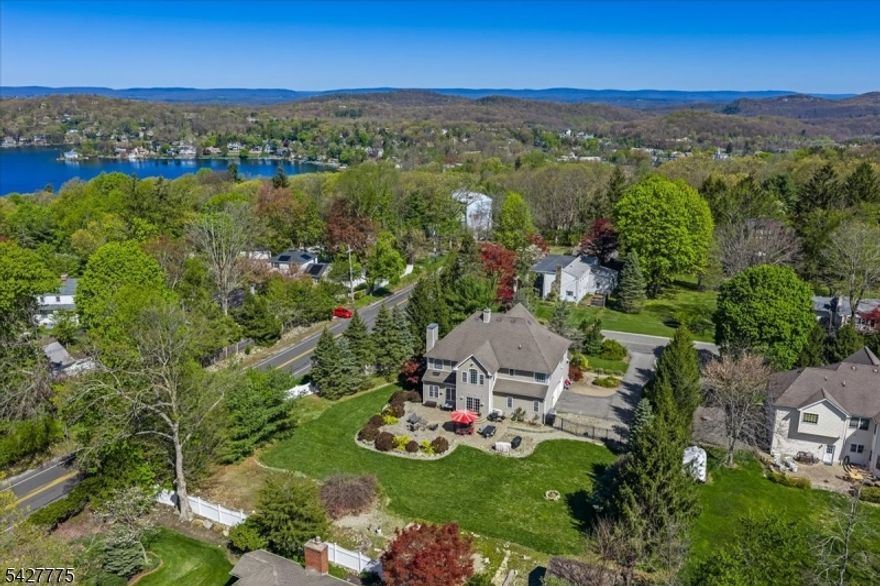 This spacious and inviting 4 Bed, 3.5 Bath colonial is a MUST SEE! In the heart of Sparta, this home features an open concept layout, generous living spaces, a bright and airy kitchen, formal dining room and living and family rooms perfect for everyday living and entertaining. Enjoy some popcorn while watching a movie in the first floor MOVIE THEATRE! The expansive primary includes HUGE walk-in closet and ensuite bathroom includes separate toilet area, tub and stall shower. Bdrms 1&2 share a jack and Jill while bedrm 3 has full bath and walk-in closet. In addition to the living space and gym room, you will not be without ample storage options in the basement! The massive, fenced in backyard is flat with a large patio area ideal for bbqing hosting gatherings. This home is a perfect blend of style and practicality. You can not beat the ease of center town shopping and highway access in this location, don't let his beautiful home get away from you!