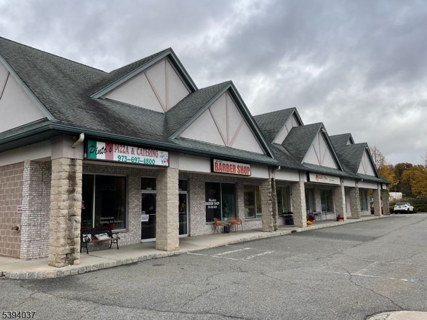 Prime Opportunity - Well Maintained Mutli - Building Commercial Plaza - offers great visibility - Building 1 - 12,000 sqft - Building 2 - 4,000 Sq.ft.  All storefront fully occupied w/mo to mo tenants - Septic - Town Water & Natural Gas