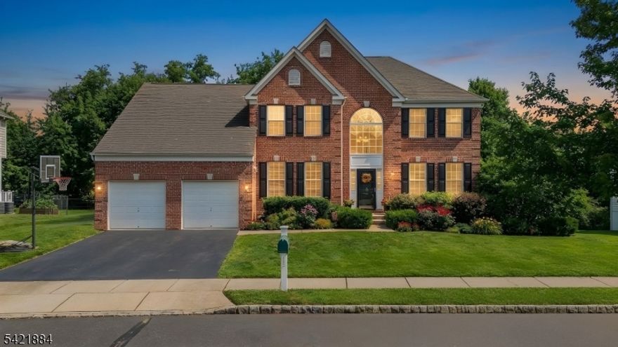 Welcome to this beautifully maintained 4-bedroom, 2.5-bath home set on a premium 0.62-acre lot in the sought-after Parkside at Mountain View community of Hillsborough. Offering privacy and space, this 3,200+ sq ft home welcomes you with a bright two-story foyer and hardwood floors. Formal living and dining rooms provide elegant entertaining options, while the open-concept kitchen is equipped with stainless steel appliances, a natural gas cooktop, and built-in double ovens. The kitchen flows seamlessly into a spacious family room highlighted by a dramatic floor-to-ceiling stone fireplace. The first floor is complete with an office / den area, laundry room, powder room, and sliding door leading to a composite deck overlooking the private backyard with above ground pool. Upstairs, the impressive primary suite features a sitting room, two walk-in closets, and a luxurious ensuite bath with dual vanities, soaking tub, and stall shower. Three generously sized bedrooms and a full bath complete the second level. Located in a vibrant community close to major highways, shopping, and everyday conveniences, all within the highly rated Hillsborough Township School District this is one you don't want to miss!