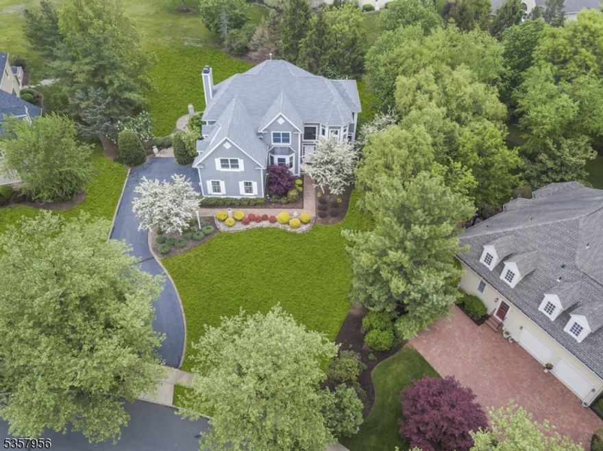 Welcome to this Cherry Valley stunner with a view of the fifth fairway. This property bosts over $200,000 in recent upgrades. The two-story foyer is surrounded by a library/office, coffered living area, and dining room/bar area with atrium doors. The custom gourmet kitchen includes Greenfield Kitchens cabinetry, an expanded island, high-end quartzite countertops, premium Ruvati sinks, and high end luxury appliances.Interior upgrades include new flooring, a full repaint, and upgraded bathrooms. Smart features include energy-efficient LEDs, smart outlets, and a full ethernet network. The heating and cooling system was updated, and the roof was replaced in 2020.Exterior tech upgrades include an advanced security system, new garage door opener, 220V EV charger outlet, and new man-door. The stone patio offers golf course views, and the hot tub was upgraded. Landscaping was redesigned with a new irrigation system. The owner's suite has golf course views, a modern bathroom, sitting area, two walk-in closets, and a bonus room. The upper level includes a Jack-and-Jill bathroom, Princess Suite with private bathroom, and each bedroom links to a full bathroom. The finished basement features a recreation room, game room, in-law suite with bedroom, full bath, walk-in shower, cedar walk-in closets, and private entrance. Cherry Valley offers various club memberships and is located in the award-winning Montgomery Schools district, minutes from Downtown Princeton, NJ.