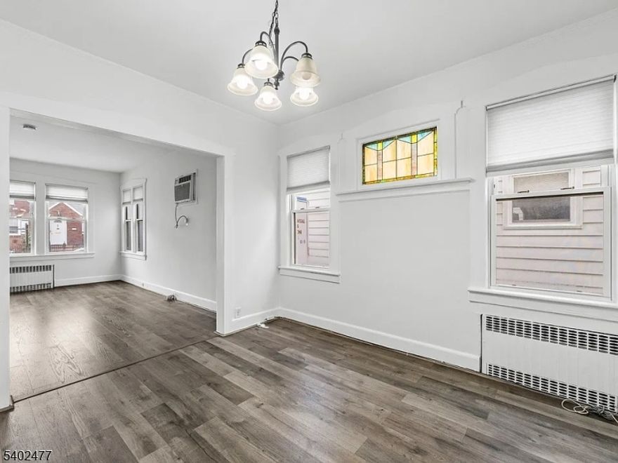 Renovated first-floor 2-bedroom, 1-bath apartment with spacious living and dining areas. Enjoy a private backyard and convenient on-street parking. Close to transportation, shopping, and major highways.