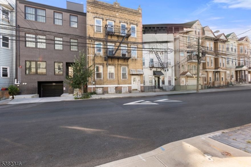 Welcome to 133 Hopkins Avenue, a beautifully updated condo located in the highly sought-after Heights section of Jersey City. This two-bedroom, one-bathroom home offers a bright and inviting living space with sleek finishes, a functional eat-in kitchen, and spacious bedrooms. The living room showcases a striking exposed brick wall, adding warmth and urban character to the space. Thoughtfully designed with a balance of comfort and style, this home also includes a brick exterior, unfinished basement, and on-street parking. Monthly fees cover heat, water, sewer, trash collection, snow removal, and common area maintenance, making ownership simple and convenient. Ideally situated near shopping, dining, and public transportation, this condo is an excellent choice for first-time buyers, investors, or anyone seeking a modern and cozy urban retreat in one of Jersey City's most vibrant neighborhoods. Don't miss this opportunity to make 133 Hopkins Avenue your own.