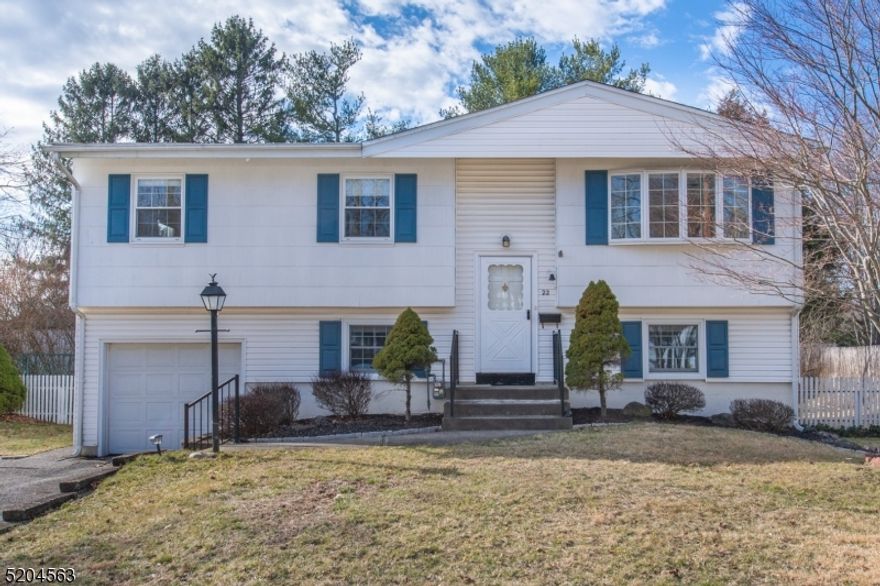 Well maintained bilevel with great, level yard in fantastic neighborhood!  Features include hardwood flooring, thermal pane windows, patio, public utilities, central air, furnace new in 2022 with humidifier, all appliances included, attic storage and attached garage.  Convenient to downtown Newton and Rt. 206.