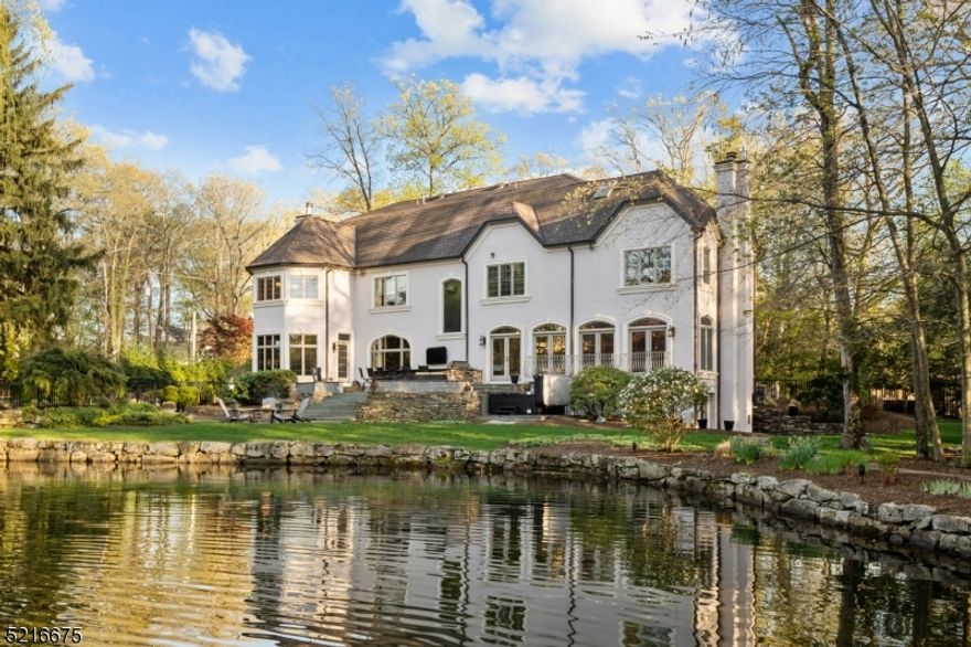 You're not just buying a home, you're buying a LIFESTYLE!  Renovated 9,500 sqft of finished living space on nearly 1 acre of waterfront property along the privacy of the Cove.  Featuring 5 beds/8 baths/3 car garage/walk-out finished bsmt w/full bar & wine cellar/basketball court/dock/fire pit/hot tub/two outdoor kitchens.  Absolutely stunning gourmet chef's EIK w/ center island/Wolf/Sub-zero/breakfast nook/pantry.  Over-sized primary suite with two full baths, one spa-like bath completely renovated overlooking Pines Lake!  Unheard of bonus side lot for Pines Lake with basketball court and play area.  The minute you walk in the 2-story foyer, you will instantly be mesmerized by the view and serenity of this one-of-a-kind waterfront home! A private hidden gem just 28 miles outside NYC!