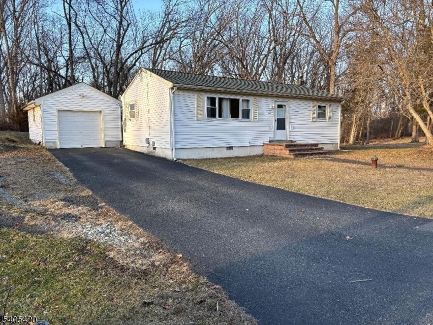 This well maintained 2 bedroom ranch is move in ready and located on a cul-de-sac offering a private, open level lot.   Kitchen has been updated with a brand new refrigerator and self-cleaning stove, laminate floor and sliders leading out to a deck overlooking a private back yard.  The two bedrooms have  laminate floors,  new carpeting in living/dining room, and recently painted throughout. Brand new electric hot water heater.   Lake Tranquility membership is optional offering access to a sandy beach, swimming, electric boating, fishing, kayaking, clubhouse and year round recreation.  Just a short drive to major routes, shopping, and restaurants.