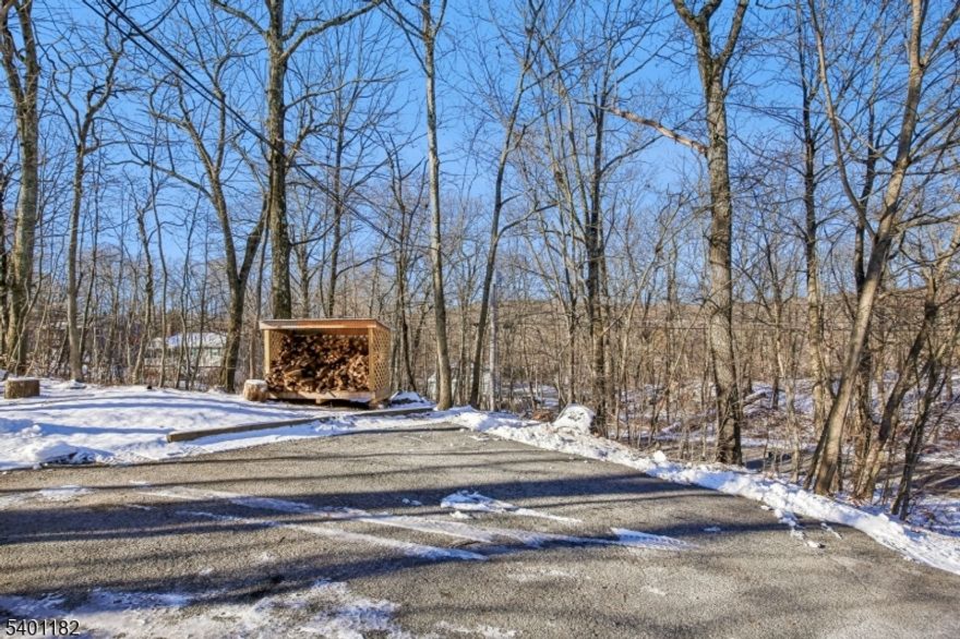 Enjoy privacy in this newly updated, well-maintained ranch-style home in the desirable Barry Lakes section of Highland Lakes, Vernon Township. This charming property features 3 bedrooms, 2 bathrooms, and an attached 1-car garage with ample driveway space. Tucked away on a quiet dead-end road, the home sits back from the street and offers peaceful seclusion from your back deck, side and backyard. Conveniently located near the seasonal activities of Mountain Creek, close to Warwick, NY, and NYC. This home blends comfort, privacy, and accessibility.