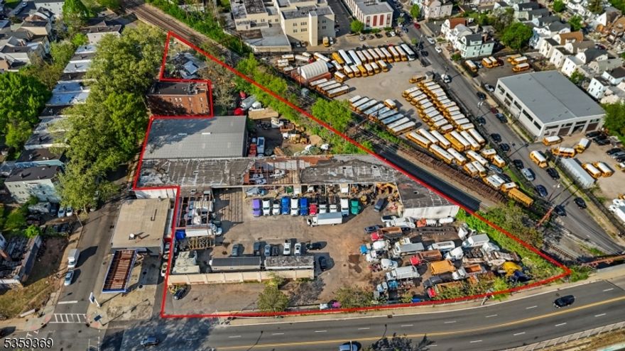 Unlock the potential of this centrally located 85,000 sq ft lot that includes a 9,000 sq ft warehouse, ideally suited for commercial use or future development. Strategically positioned on the border of Newark and East Orange, this expansive property offers easy access to major highways, ports, and transportation hubs making it perfect for logistics, storage, fleet operations, or redevelopment. The property is currently being used for commercial truck parking and equipment storage, with flexible zoning potential that opens the door to residential, mixed-use, or other commercial projects (buyer to perform due diligence). Delivered vacant and sold strictly as-is, this is a rare opportunity with strong upside potential. Property has two entrances: one on Park Ave and one on N 15th St. Whether you're looking to expand your industrial operations or break ground on a new residential or commercial venture, this site offers location, scale, and versatility.